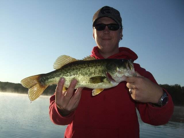 109.JPG - David’s first fish caught on the new baitcaster.  Happy guy... Much appreciated, Evan.