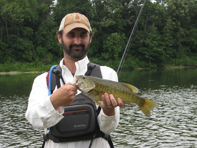 IMG_9960.JPG - Eric used light spinning gear to catch this Grand River smallmouth bass.