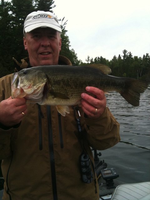 photo235235.JPG - Bob with a Largemouth Bass from Limerick Lake near Bancroft Ontario caught on a Texas Rigged Plastic Worm.