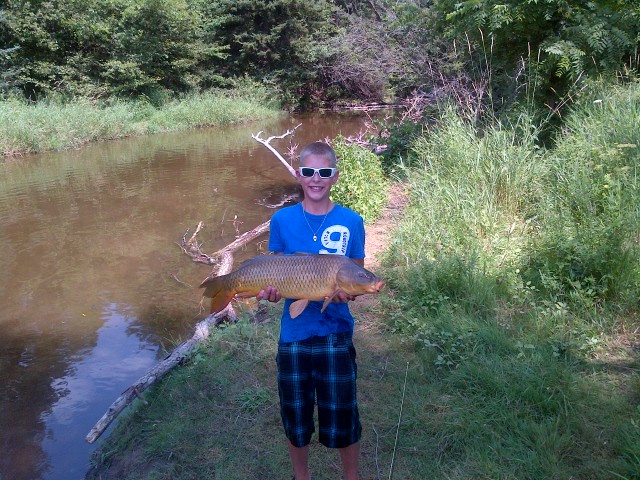 Burlington-20120723-00007.jpg - Nick from Milton with a HUGE carp from Lowville on a 7wt fly rod.