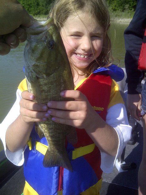 IMG-20120701-00039.jpg - Olivia was casting the shore line at Conestoga and picked up this Smallie that need two hands !