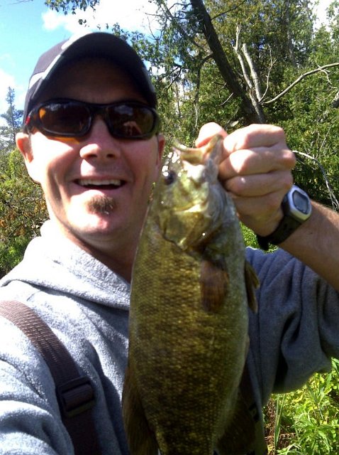 IMG-20120919-00228.jpg - Yet another Smallmouth Bass caught by Ian on his lucky Ecogear CK50 Premium Edition.