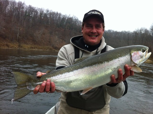 IMG_2824.jpeg - Les on the Big Manistee in Michigan with as spectacular a steelhead as you will catch!
