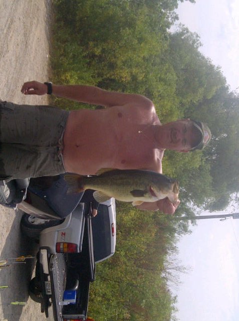 M5.5.jpg - Marcus with a beautiful Guelph Lake Largemouth.