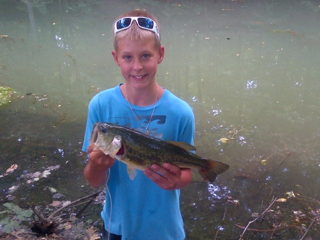 Milton-20120718-00001.jpg - Nick with a nice Largemouth on a 5 weight fly rod.