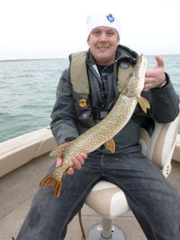 P1000138.jpg - Dave and a 5lb Pike from Lake Erie.