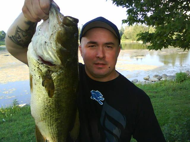 ark_23423523525.JPG - Ark caught this huge largemouth at the reformatory ponds on a Live Target Frog.