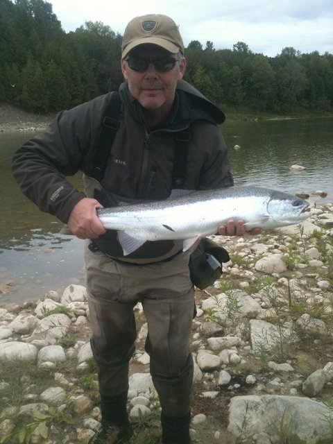 john_374982635.JPG - John with the first Steelhead picture for the Fall of 2012