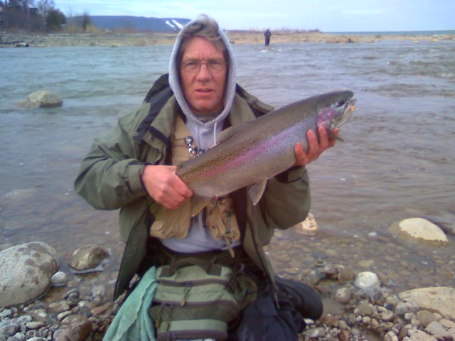 lee_4345453454.JPG - Lee at the mouth of Thornbury braving the elements to catch fall steelhead.
