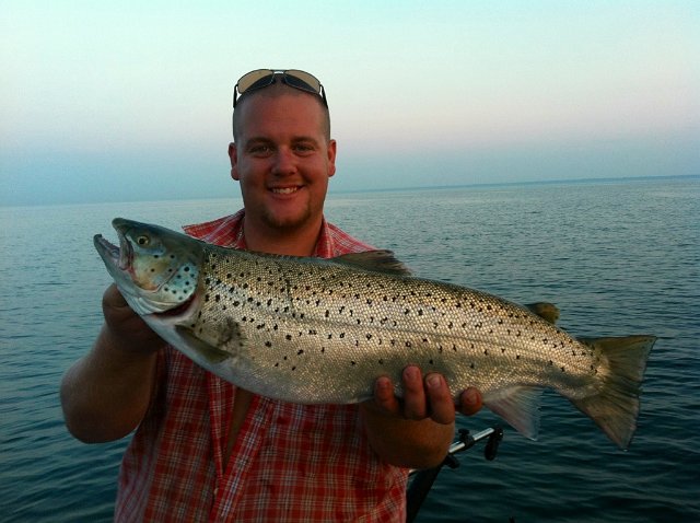 matt_35423523.JPG - Matt with a Lake Ontario Brown Trout while Down rigging.