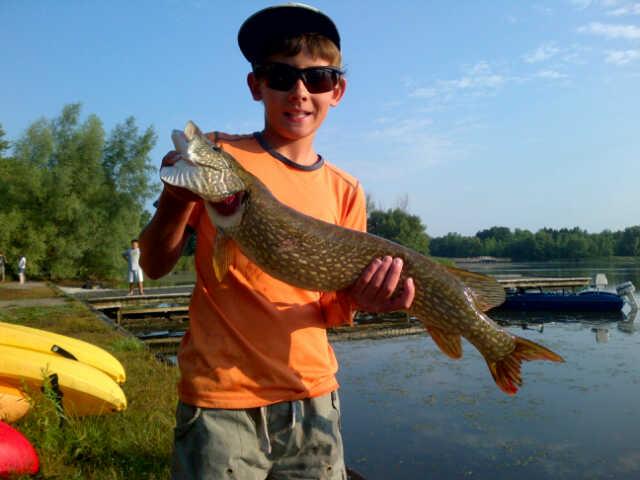 tristan_324236t23.JPG - Tristan was in the Valens Conservation Area derby on the weekend and won the Junior division pike trophy with this 5lb 12 oz pike. It was bigger than winning pike in the adult division!