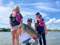 Jay and the girls ( Kate and Sarah ) with a great Scugog Lake "Tournament Bag" ... INCLUDING a 6.25 Smallmouth Bass ...