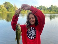 Maya with a AWESOME Fairy Lake Largemouth Bass ... The smile says it all!