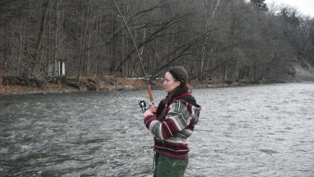 DSCF5203.JPG - Brittany fighting a huge Steelhead on a Lake Ontario tributary....Calm, cool, collected ...
