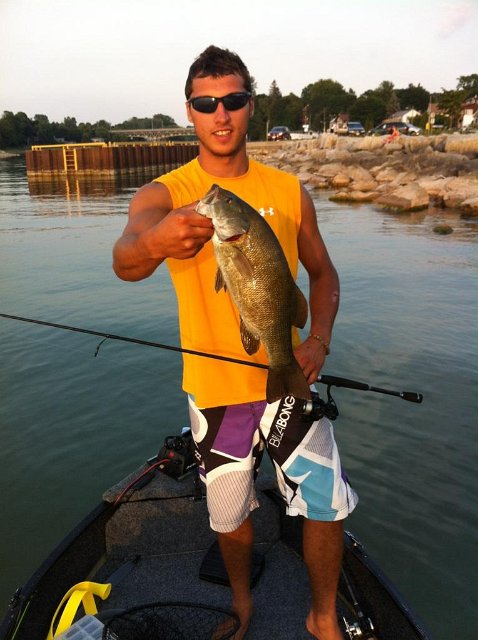 chris_2525.JPG - Chris with a nice smallmouth bass while in Southampton.